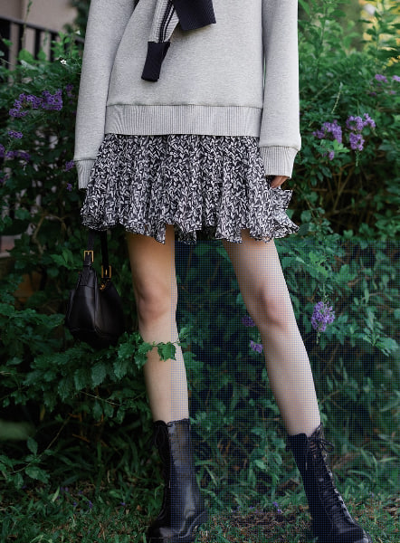 ELLE法式设计感碎花短裙女25秋季新款时尚别致伞裙小众a字半身裙